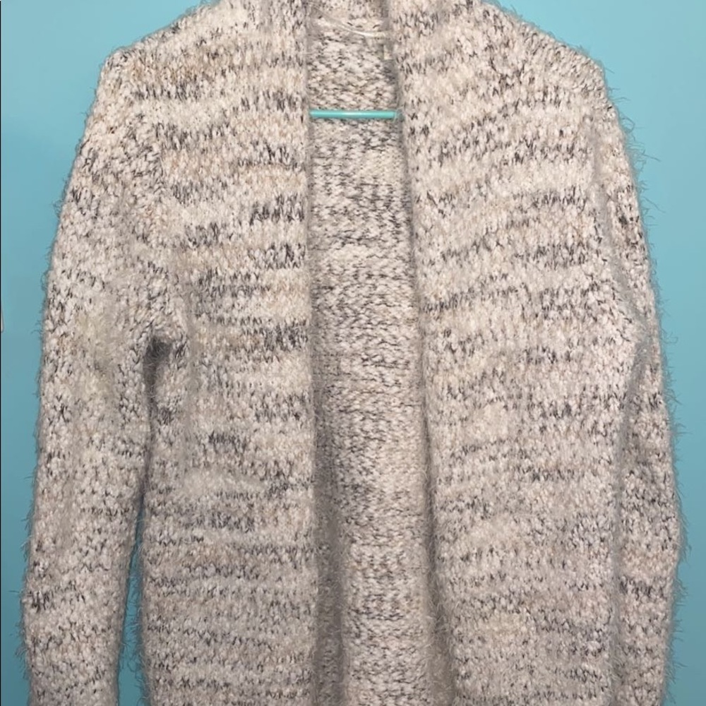 white and grey cardigan